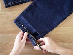 Ourlet pantalon main